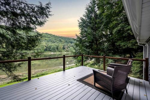 Scenic Retreat: Riverfront Cabin with Large Deck and Fire Pit in Emlenton, Pennsylvania