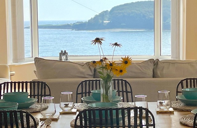 Sea front house.Stunning views, Dog friendly, 100m to beach, Hot Tub.EV Charger