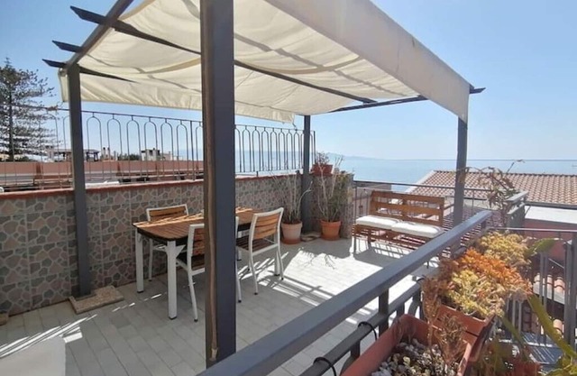 Seafront, attic room with terrace.