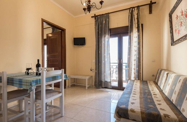 Seaview apartment steps from sandy beach and Chania town center