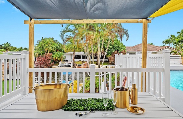 Secluded Canal Sanctuary: Private Beach, Boat Dock, Pool, Mini-Golf Extravaganza