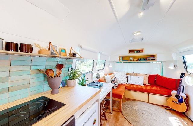 Secluded riverfront retreat with gorgeous lake views and adorable interior