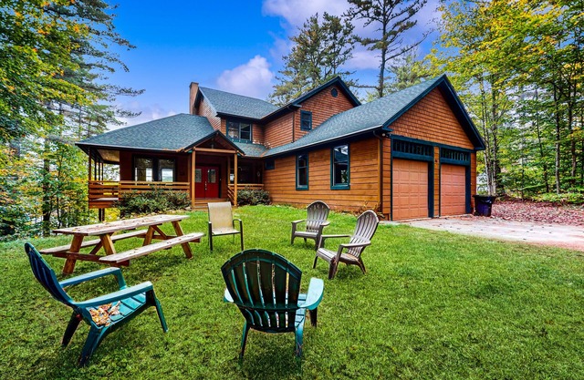 Sensational lakefront retreat with private beach, firepit, wood fireplace, & W/D