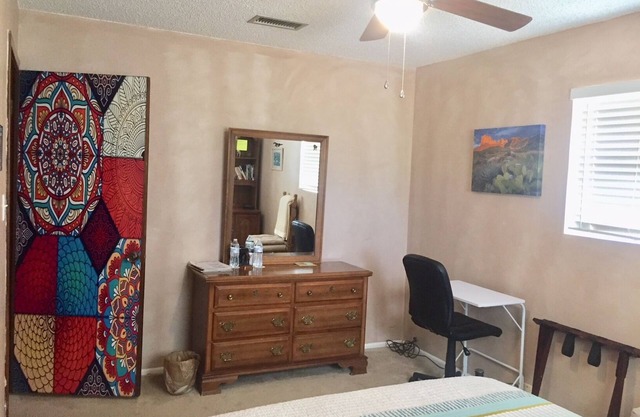 Shared space in quiet home with three dogs and a cat. Private bedroom & bathroom