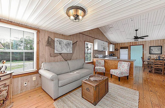 Shipwrecked Shack Waterfront House Boat on Land
