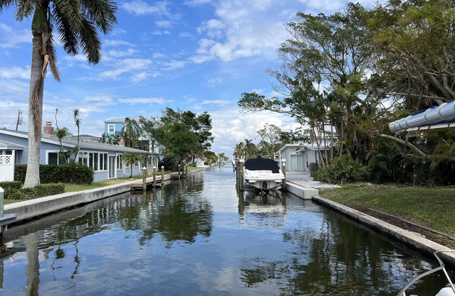 Short walk to beach or take your boat from the canal /dock in your backyard!