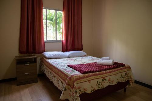 Sitio encantador e tranquilo com churrasq e Wi-fi