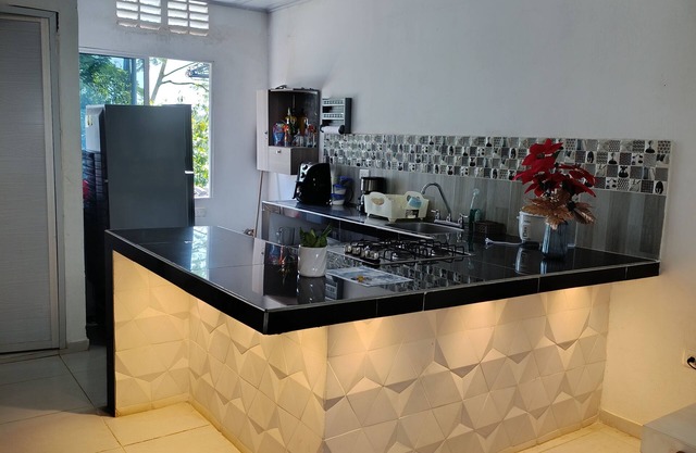 Spacious 2-bedroom cottage in tranquil Doradal Antioquia with AC, WiFi