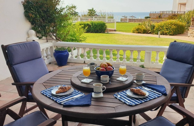 Spacious 2 bed, 2 bath frontline beach house. Sea & pool views metres from sea