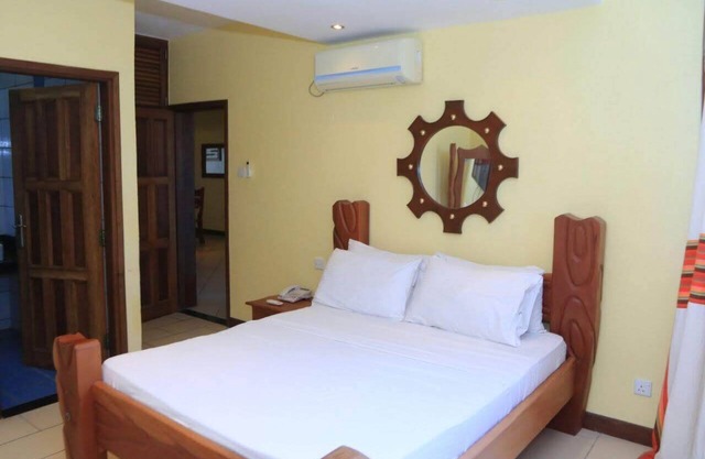 Spacious 3-bedroom apartment with fitness room, WiFi in enchanting Mombasa