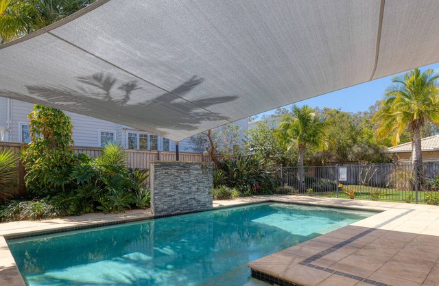 Spacious 4-Bed Home with Pool and Veranda