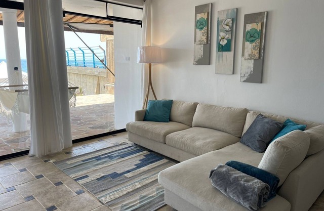 Spacious 4-bedroom house with WiFi, AC in welcoming Punta Sal