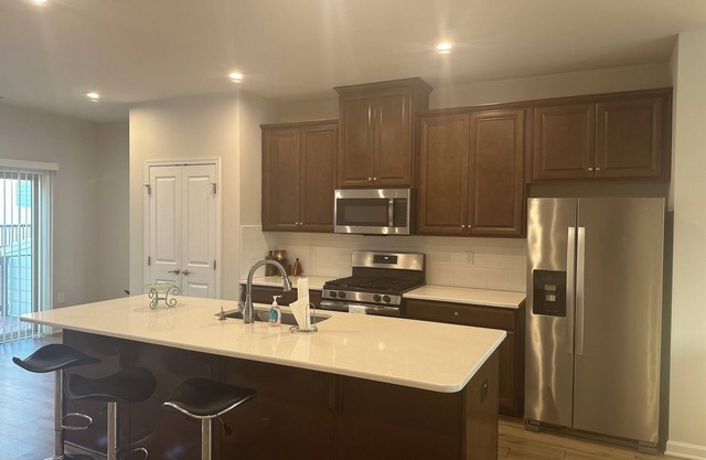 Spacious 4-bedroom townhome in charming Cary with WiFi