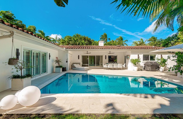 Spacious 5-bedroom house with beautiful backyard with pool in Key Biscayne