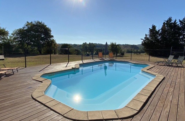 Spacious 7 bedroom house with two acres of gardens, outdoor pool and games room
