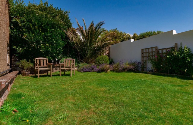 Spacious family house with panoramic sea views - short walk to the beach.