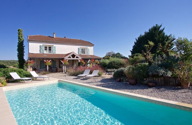 Spacious farmhouse with private heated pool, sleeping up to 8.