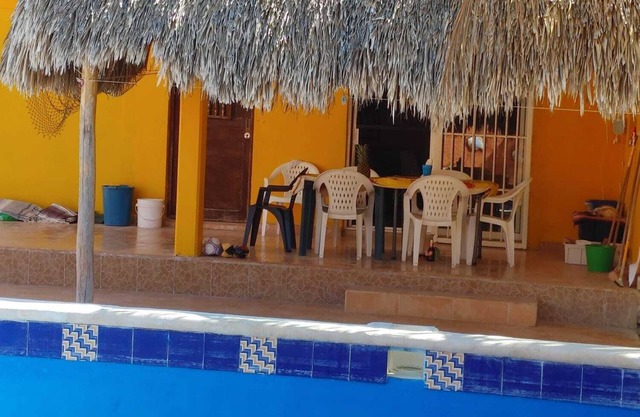 Spacious Gated Beach House with a pool. Less than 150 meters from the beach