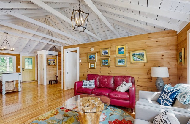 Spacious lakefront home with stunning views, hot tub, fire pit, dock & swimming