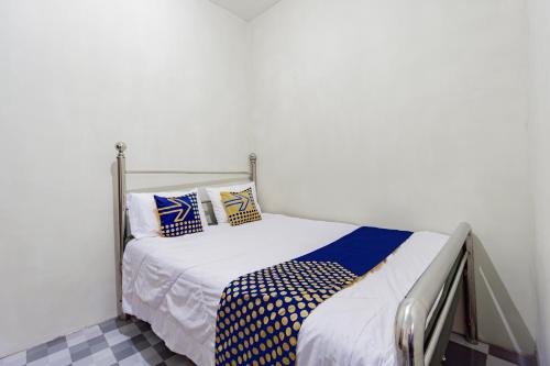SPOT ON 93967 Hasna Guest House Syariah