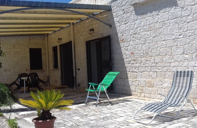 Stone villa in the middle of the Apulian countryside and a few kilometers from the sea.