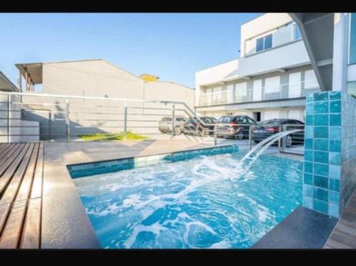 Studio aconchegante com piscina a 350m da praia