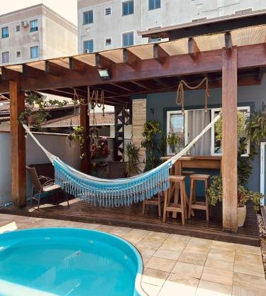 Studio in Joinville, piscina - Pet Friendly
