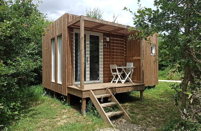 Studio in quiet garden with trees