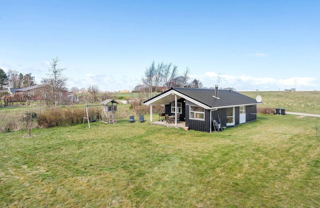Stunning home in Askeby with sauna