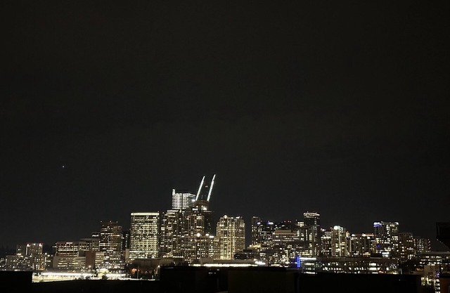 Stylish 2BR: City Views, Dual Workspaces & Gym Access