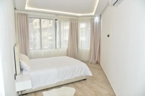 Stylish 3-Bedroom Flat in Kenitra Center Ville with Parking & Comfort