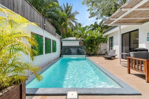 Stylish Modern Home with a Tranquil Outdoor Oasis, Spacious Open Floor Plan, and Private Swimming Pool