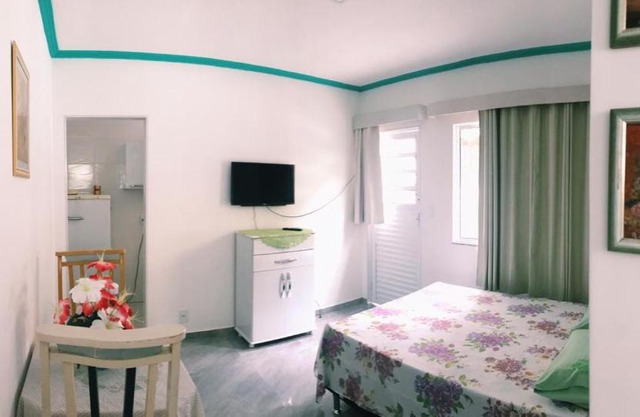 Suíte com cozinha no quintal da casa