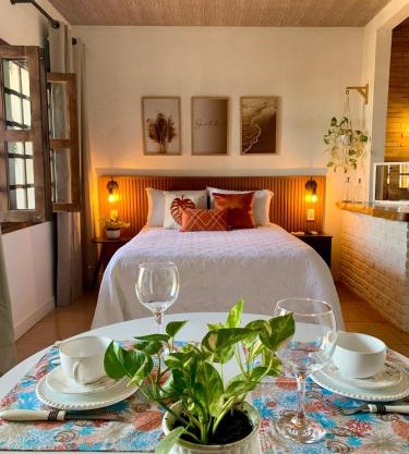 Suíte frente mar com cozinha e quintal pés na areia