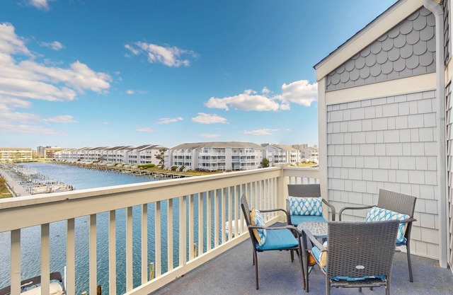 Sunny Waterfront Condo w/Canal Views, Balcony, Central AC, Shared Pool & Tennis