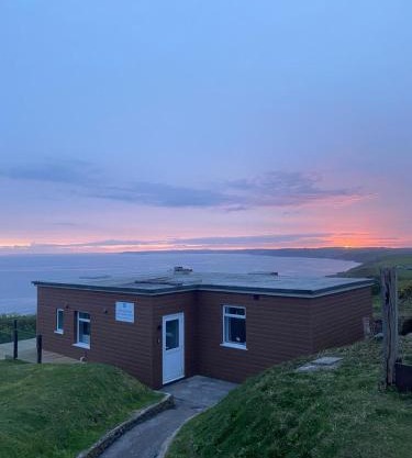 Sunset sea view chalet with hot tub