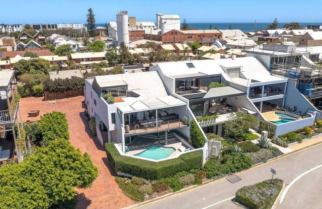 Superb Riverfront 3-Storey Home with Pool, deck and space