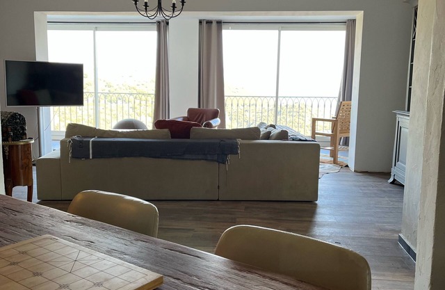 superb villa village center exceptional view. Swimming pool and wooded grounds.