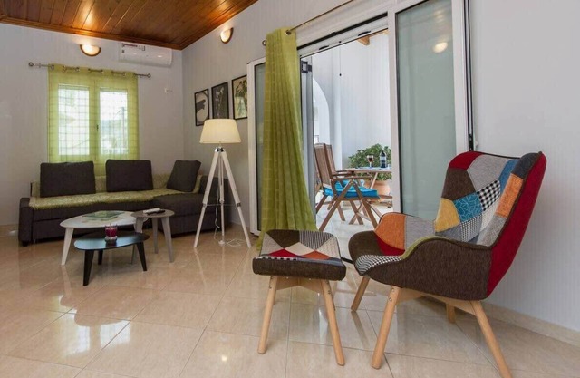Thano's stylish flat, just 150m to the beach