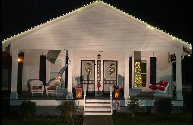 The Belmont Cottage is a 100 year old charmer located near Town Square