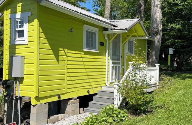 The Goldfinch rustic lakefront cottage at The Pier at Canadohta Lake sleeps 2!
