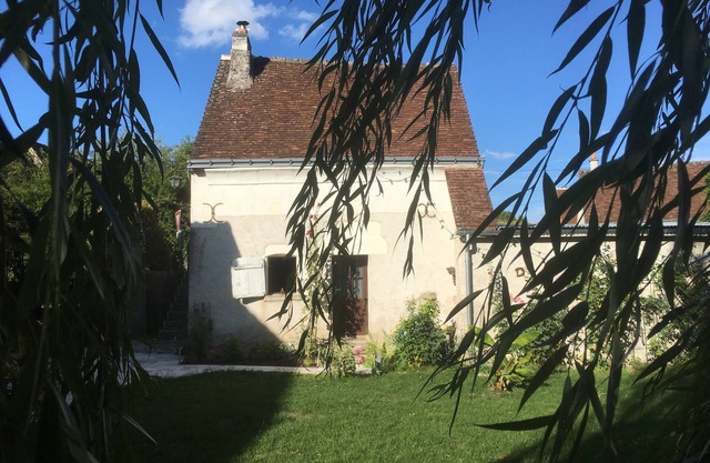 The little house in the flower garden