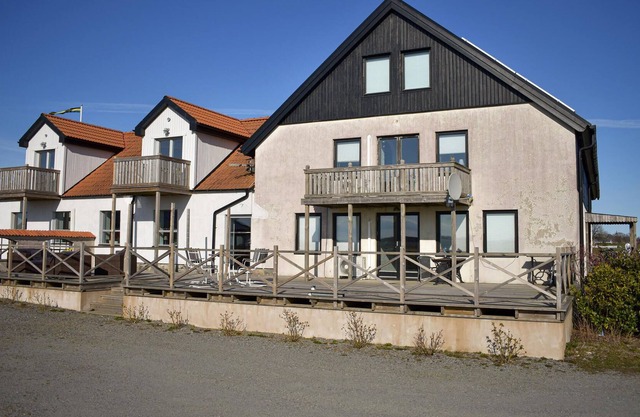 The renovated cottage on a round yard with beautiful views of the open countryside just outside the