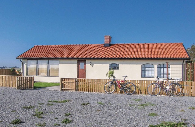 The renovated cottage on a round yard with beautiful views of the open countryside just outside the