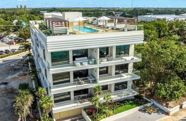 The Sands #3: New 7 Mile Beach Condo w/Rooftop Pool + Designer Interiors