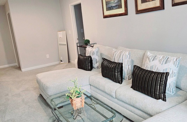 The spacious loft apartment 3/2 kingbed with stairs, pool and Grill sleeps 7.