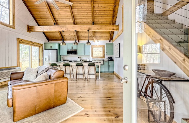 The Treehouse | Forest cabin in Blairsville with expansive deck & fireplace