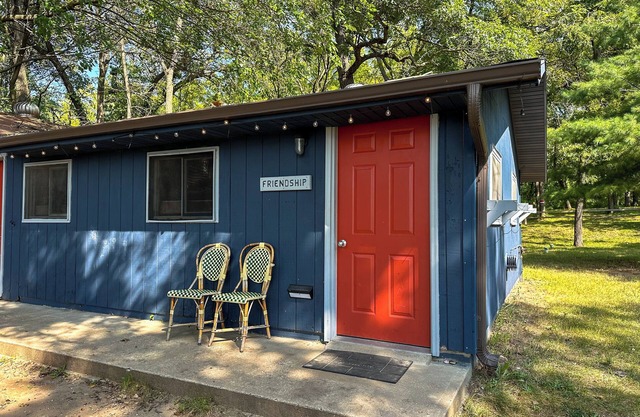 This camper cabin with attached bathroom makes the perfect summer camp retreat!