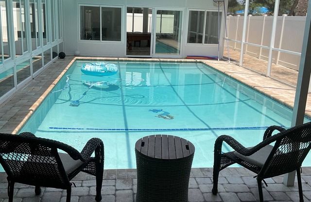 This place has swimming pool with water heater and parking for many cars.