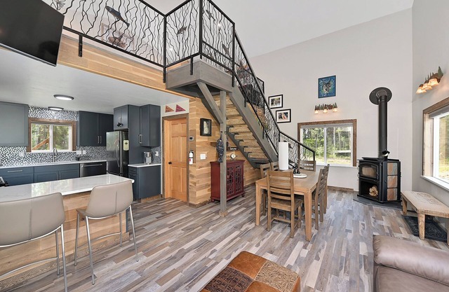 This quiet cabin on a slough of the Kenai River is what you need.